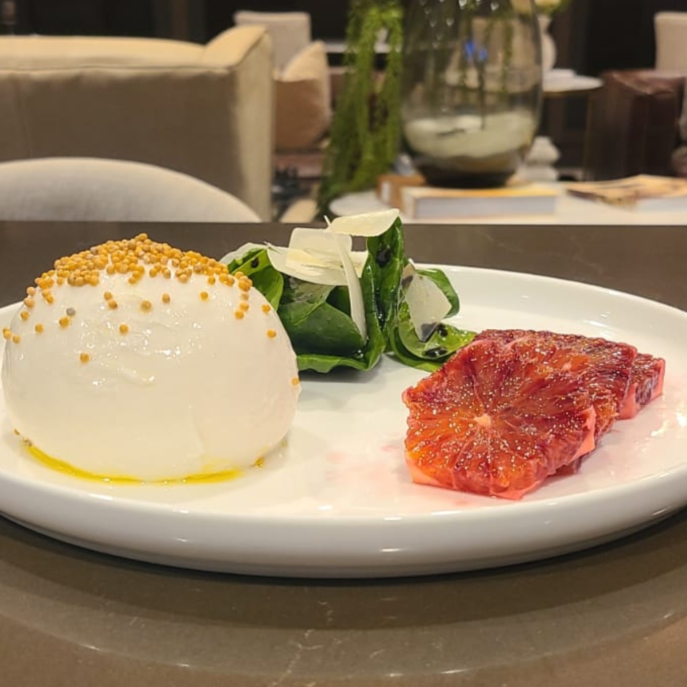 Burrata, blood orange, young spinach leaves from Epicureans of Florida - Private chef fort Lauderdale | Private chef Miami | Luxury Catering Miami | Private catering Fort Lauderdale | Personal chef Miami | Private chef near me | Home chef