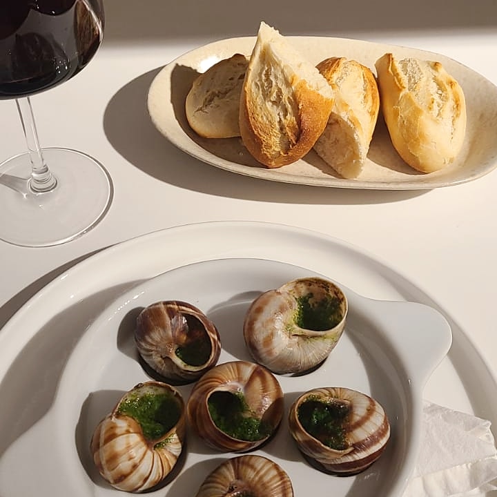 Escargots, garlic parsley butter from Epicureans of Florida - Private chef fort Lauderdale | Private chef Miami | Luxury Catering Miami | Private catering Fort Lauderdale | Personal chef Miami | Private chef near me | Home chef