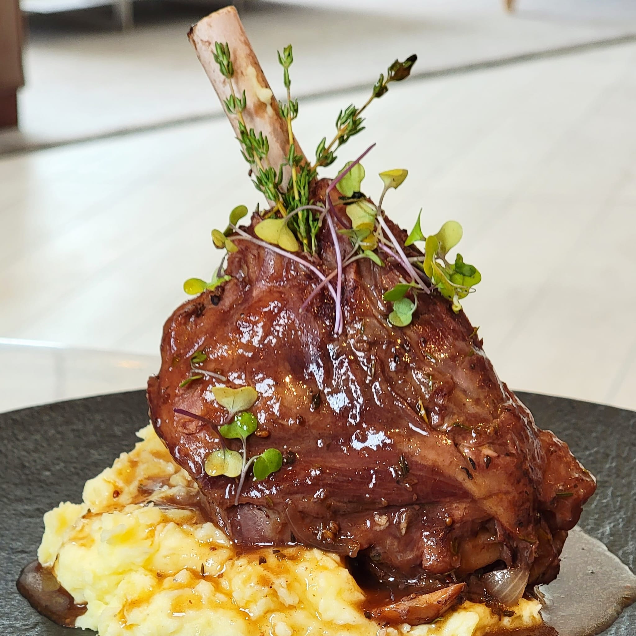 Lamb shank, mash potato, red wine jus from Epicureans of Florida - Private chef fort Lauderdale | Private chef Miami | Luxury Catering Miami | Private catering Fort Lauderdale | Personal chef Miami | Private chef near me | Home chef